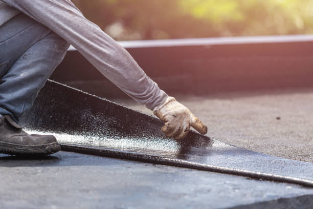 Professional Waterproofing technician working in Old Bethpage, NY